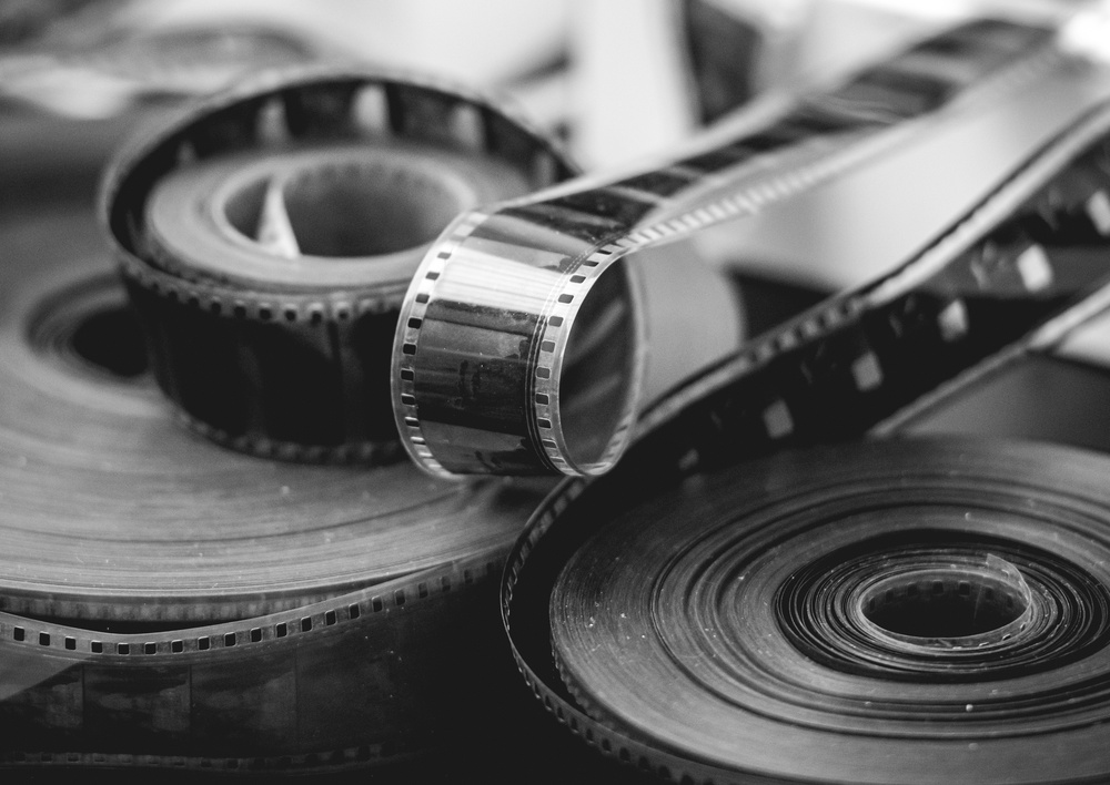 Black,And,White,Close-up,Of,Vintage,Photographic,Film,Rolls,And