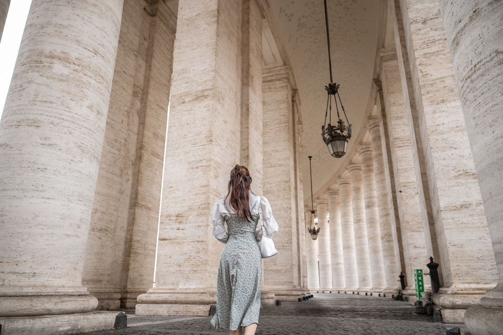 Visitors walking near the Vatican Museums entrance