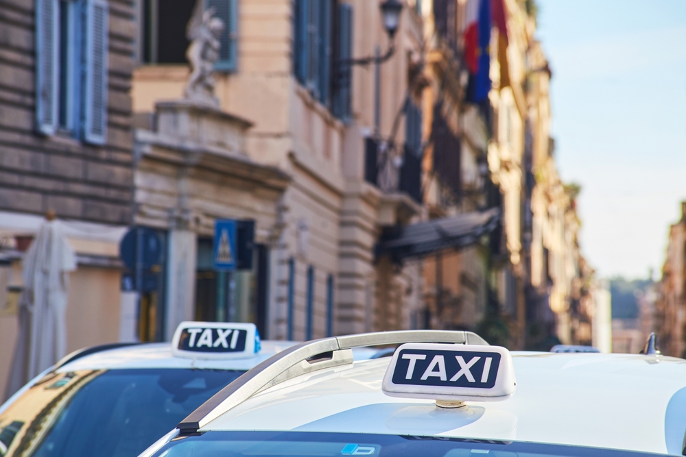 A taxi on a street near the Vatican